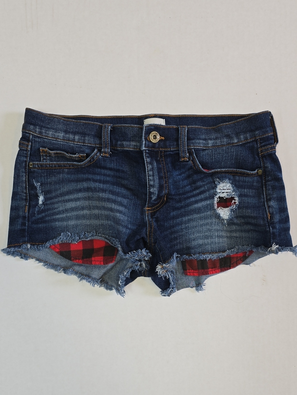 Frayed Dark Blue Denim Shorts with Red Plaid Patch Detail